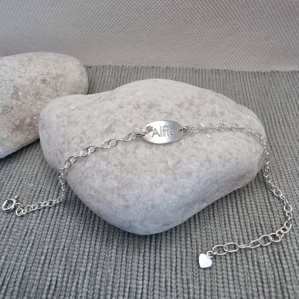 Paw print bracelet with pets name, personalised sterling silver