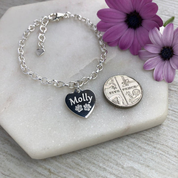 Charm bracelet personalised with name and paw prints