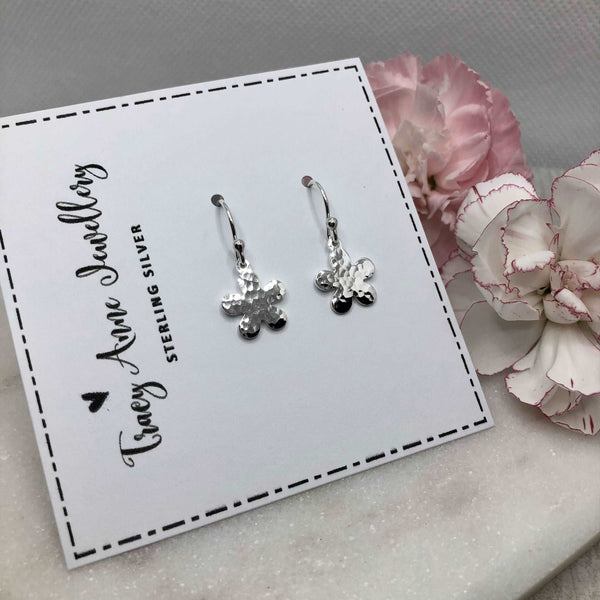 earrings, small and dainty silver flower shape with a beautiful hammered finish