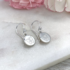 small drop earrings engraved with butterfly design