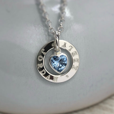 silver name necklace with crystal heart charm. Have up to 3 names engraved onto this sterling silver washer style pendant. A mix of letters and numbers can be engraved up to a maximum of 20 including spaces