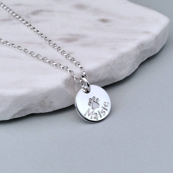 Paw print necklace engraved in sterling silver
