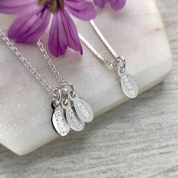 personalised name necklace, small and dainty. up to six letter per name on sterling silver oval charms