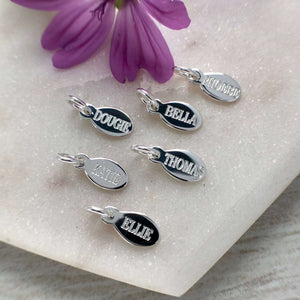sterling silver name tag, small oval charm engraved with any name or word up to six letters