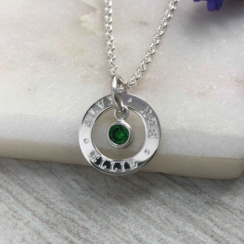 Personalised silver necklace with birthstone, up to 3 names engraved. Sterling silver washer style pendant with crystal charm suspended in the centre.