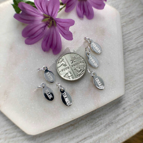 Small silver name charm / pendant / tag, personalised in sterling silver