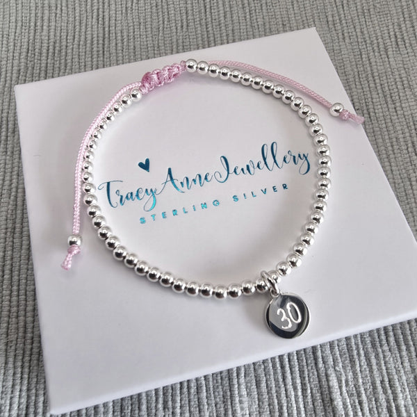 Sterling silver bead bracelet with personalised charm