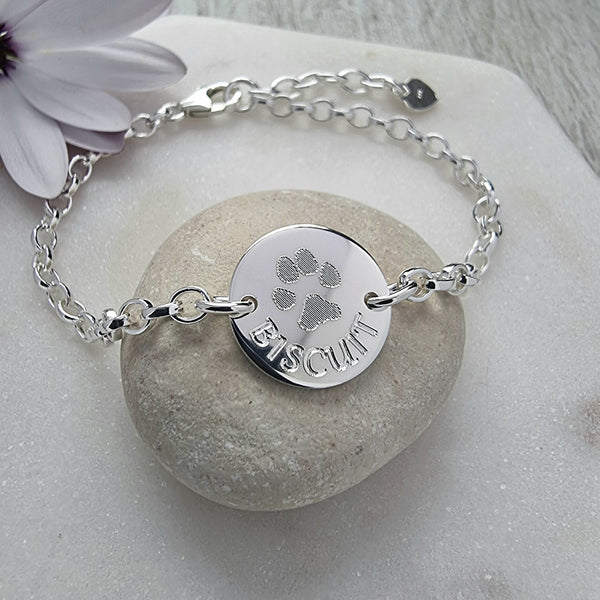 Actual paw print bracelet, your dog or cat's paw and their name will be engraved onto a lovely sterling silver bracelet featuring a 15mm wide disc