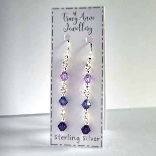 Handmade drop earrings with purple crystal beads