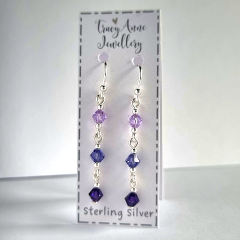 Handmade drop earrings with purple crystal beads
