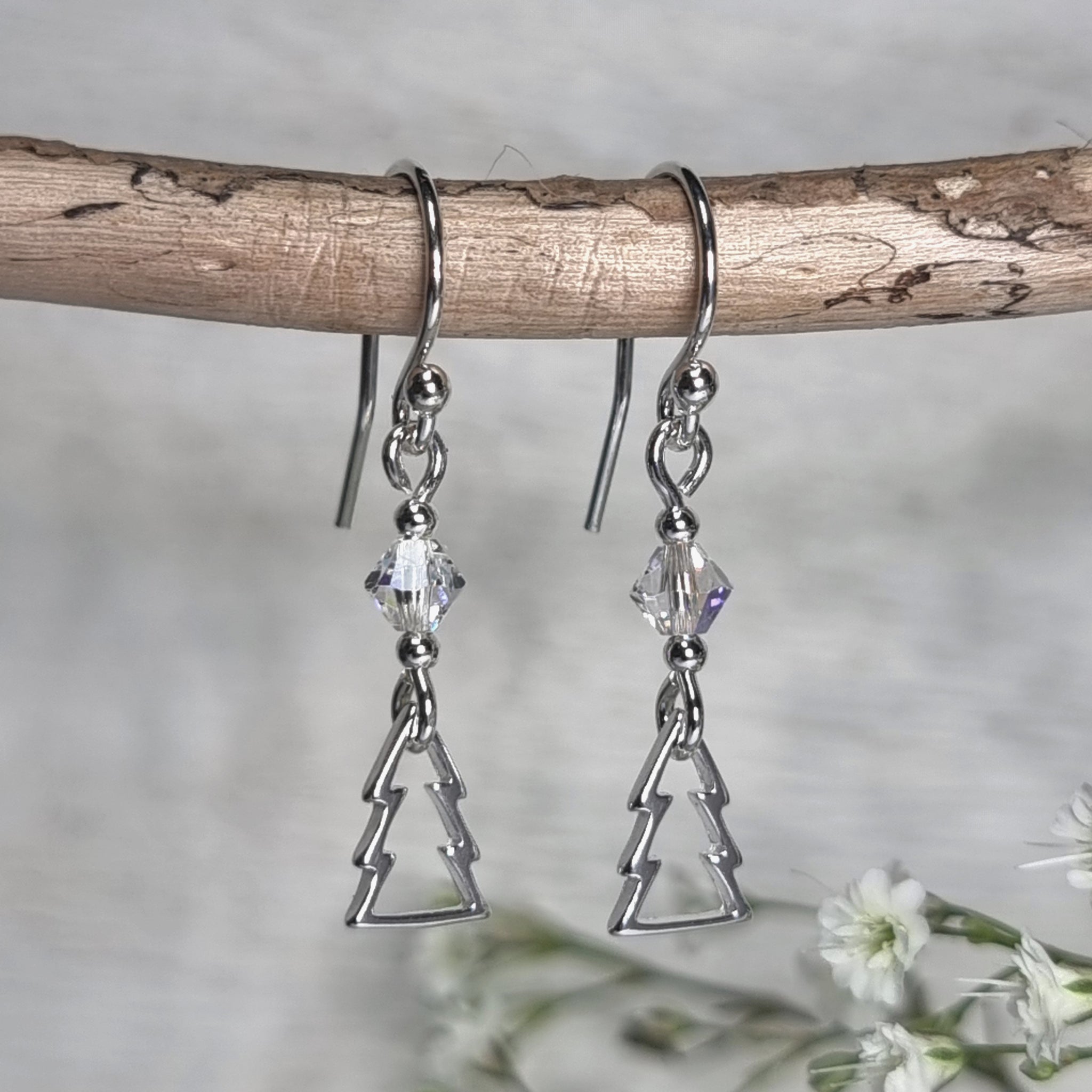 dainty sterling silver earrings with silver Christmas trees and clear crystals
