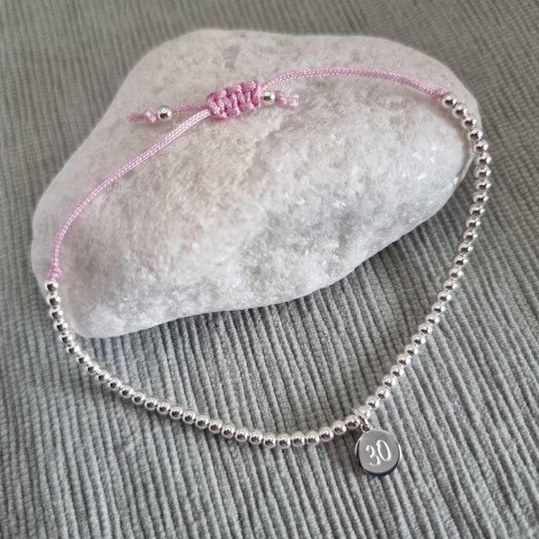 Sterling silver bead bracelet with personalised charm