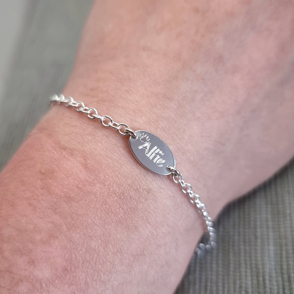 Paw print bracelet with pets name, personalised sterling silver