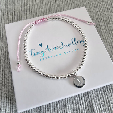 Sterling silver bead bracelet with personalised charm