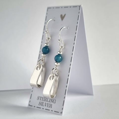 Tribal / boho style earrings, featuring hammered sterling silver teardrop loops, and gorgeous blue Apatite beads.