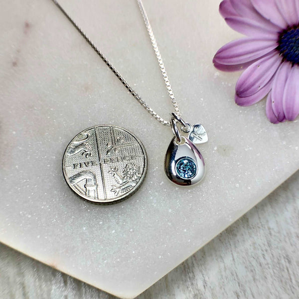 Birthstone necklace with teardrop pendant and tiny monogram heart charm