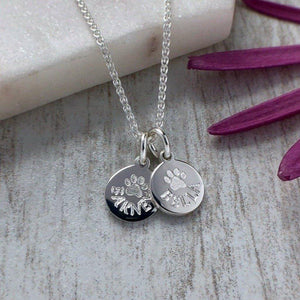 tiny paw print necklace personalised with pets name and engraved in sterling silver, 8mm