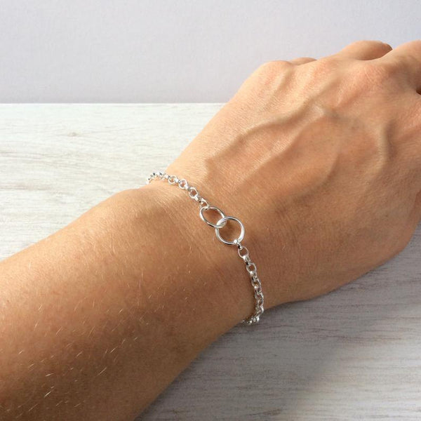 Sterling silver bracelet with two interlocking rings to symbolise love or friendship - Tracy Anne Jewellery