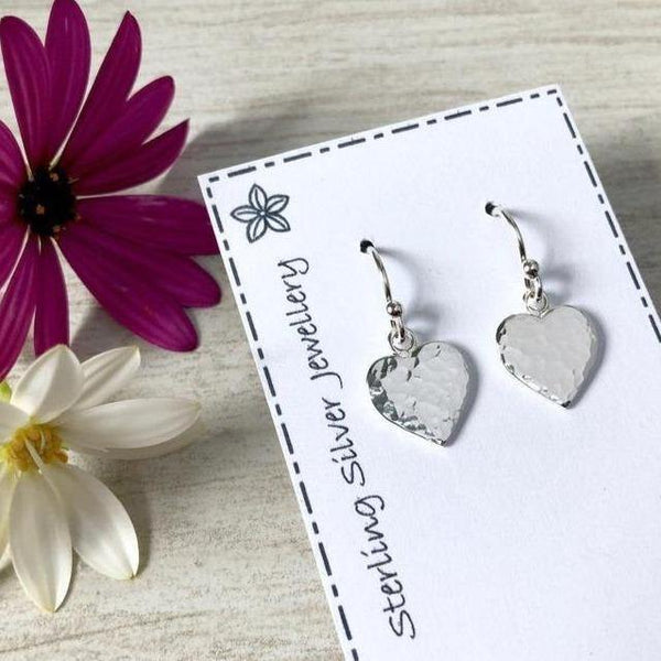 Small sterling silver drop earrings with hammered heart