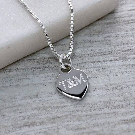 Silver necklace engraved with two initials, a lovely romantic gift for valentines day, an anniversary or a birthday. The sterling silver heart is very small and dainty, just 1cm wide.