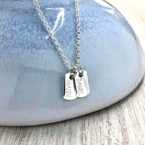 tiny dog tag necklace, personalised in sterling silver with any name or word up to six letters. small and dainty