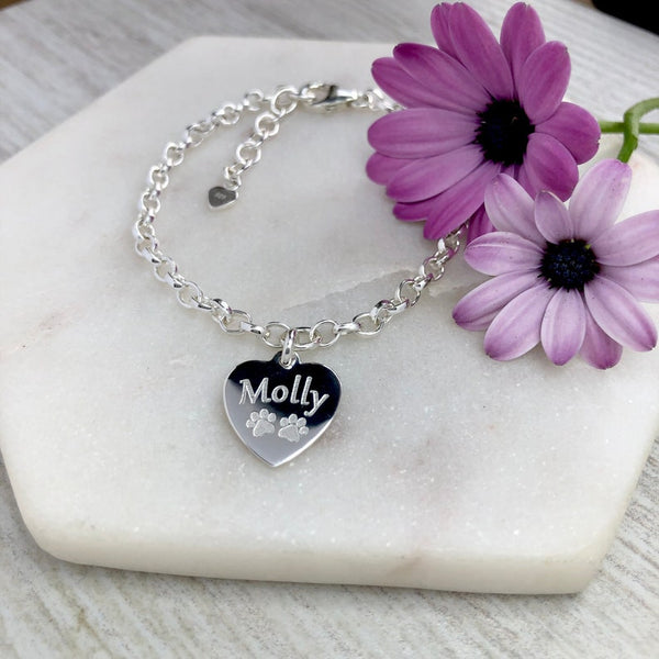 Charm bracelet personalised with name and paw prints
