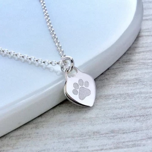 Paw print necklace, small and dainty heart pendant with pet's name on the back. sterling silver
