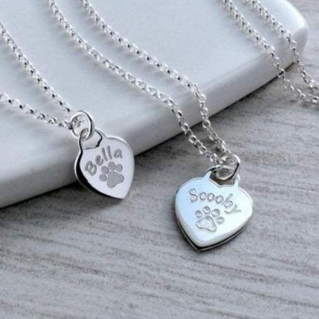 Personalised paw print necklace, engraved with your pet's name on a sterling silver heart